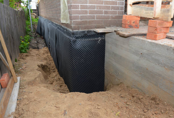 Happy homeowners after waterproofing job in Cusseta